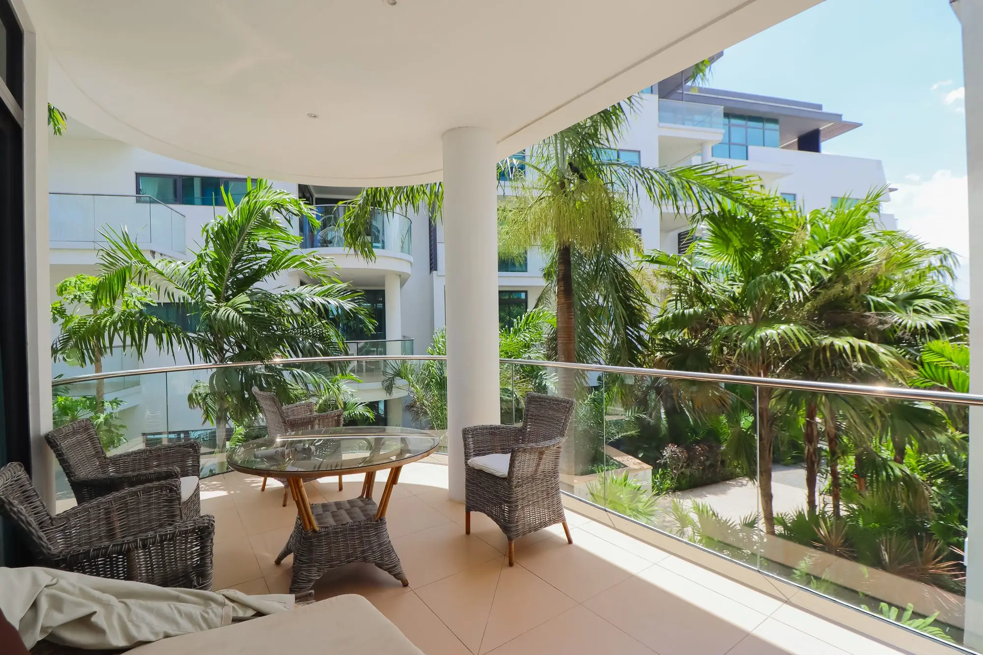 Private balcony overlooking lush tropical palm gardens at Nyali Marina Stays, Mombasa