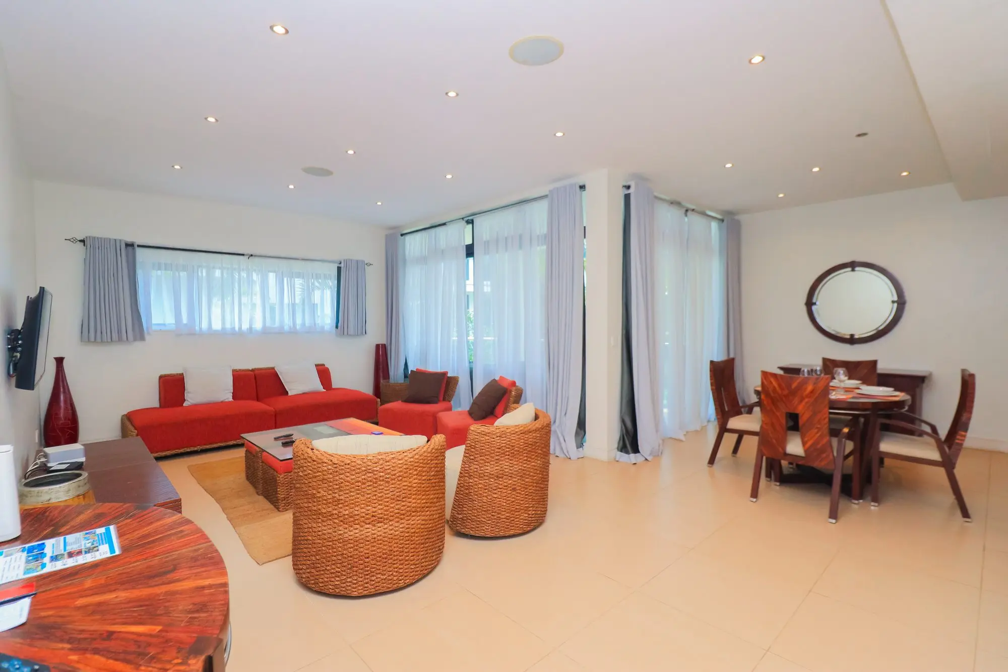 Open-plan living and dining space with garden views at Nyali Marina Stays, Nyali