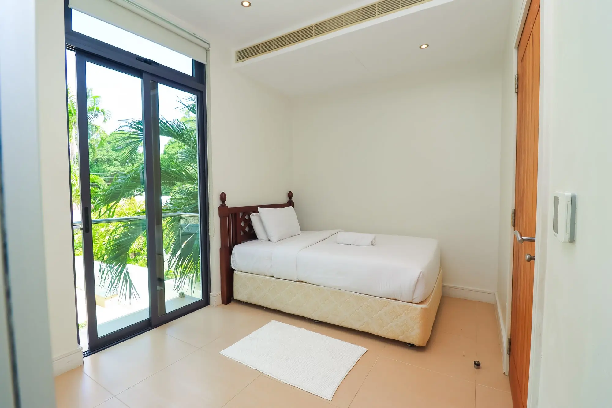Cosy third bedroom with balcony and garden view at Nyali Marina Stays, Nyali Mombasa