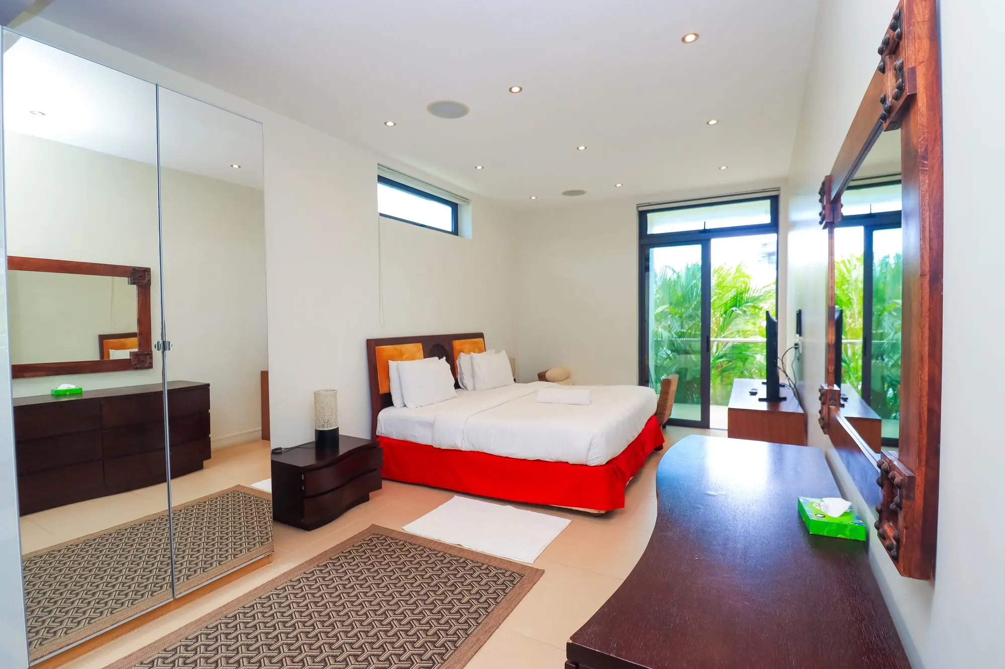 Spacious master bedroom with en-suite and tropical garden view at Nyali Marina Stays, Nyali Mombasa